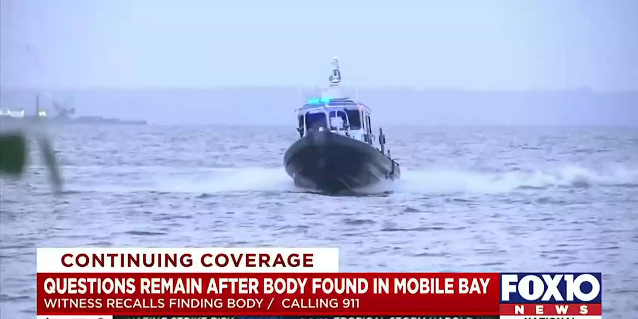 911 caller finds body floating in Mobile Bay