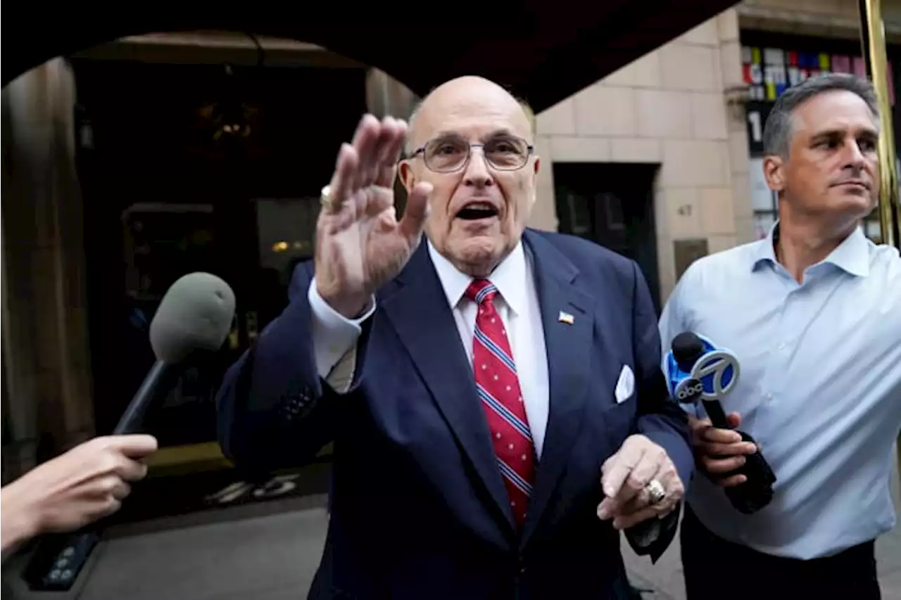 Rudy Giuliani surrenders to authorities in Georgia probe of alleged election interference