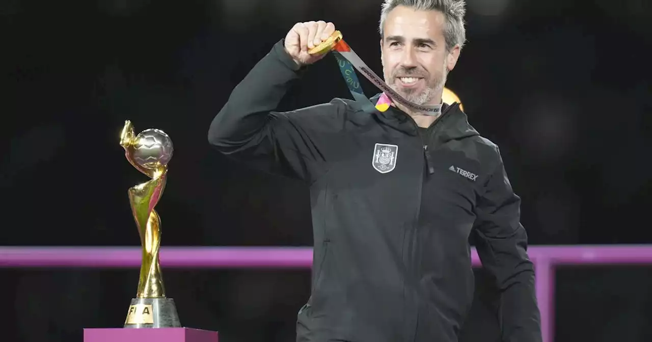 Spain soccer coach faces scrutiny for touching a female assistant on the chest while celebrating