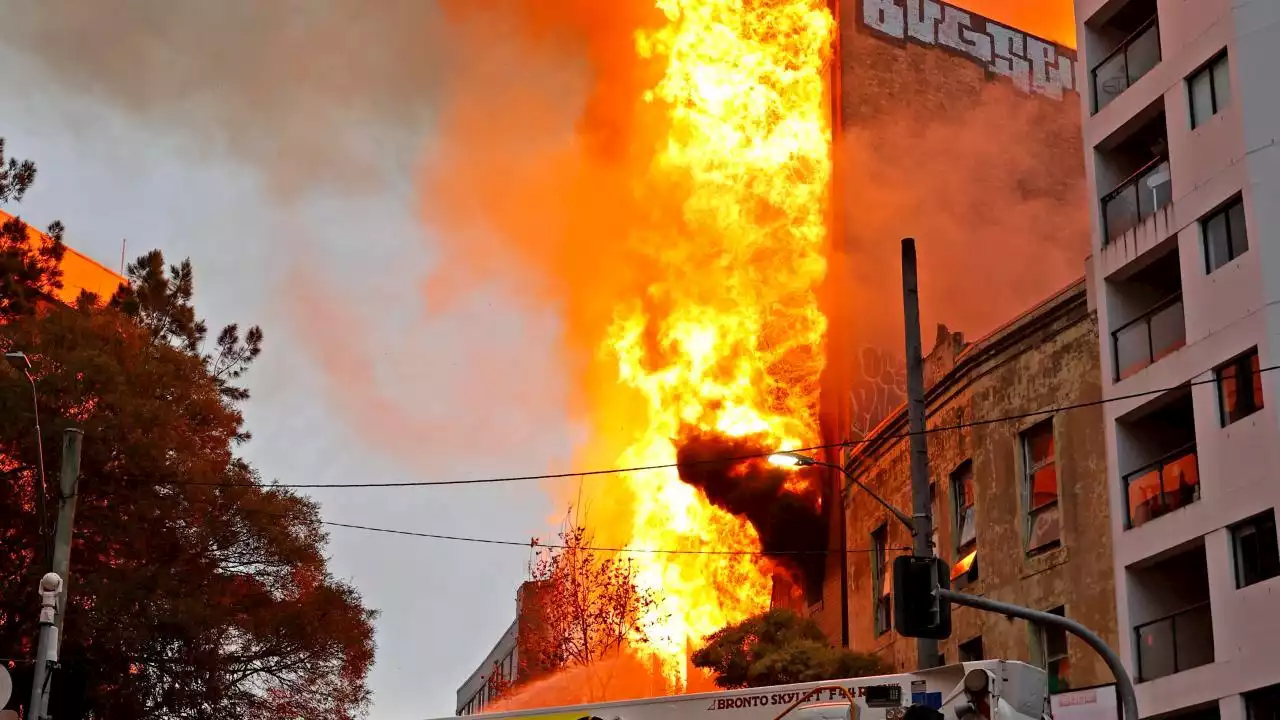 Two teens, 13, charged over Surry Hills inferno