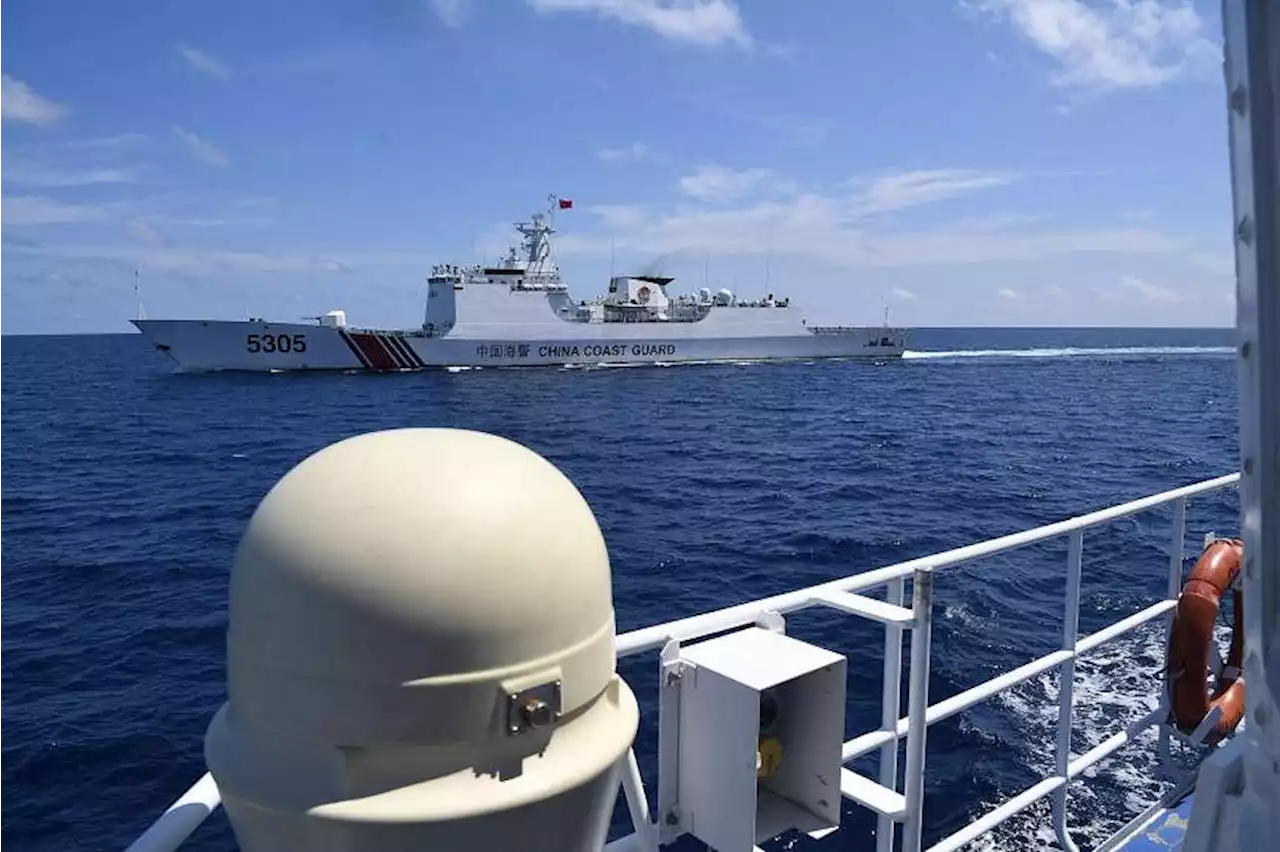 Chinese ships chase, block Philippine boats in disputed South China Sea: AFP