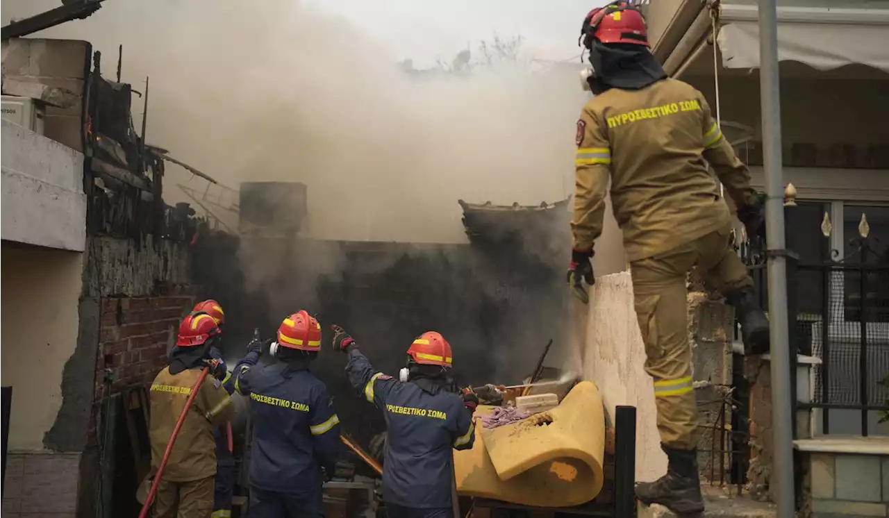 European firefighters and planes join battle against wildfires that have left 20 dead in Greece