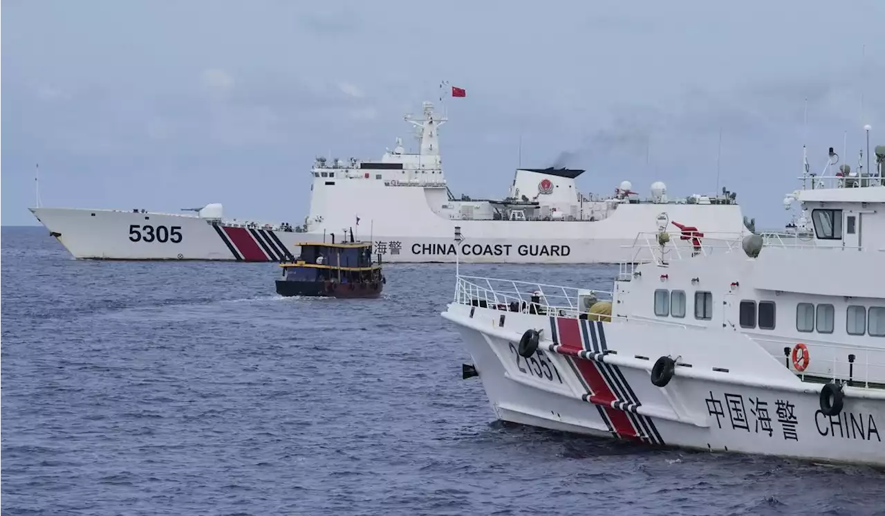 Philippine supply boats breach a Chinese coast guard blockade in the hotly contested South China Sea