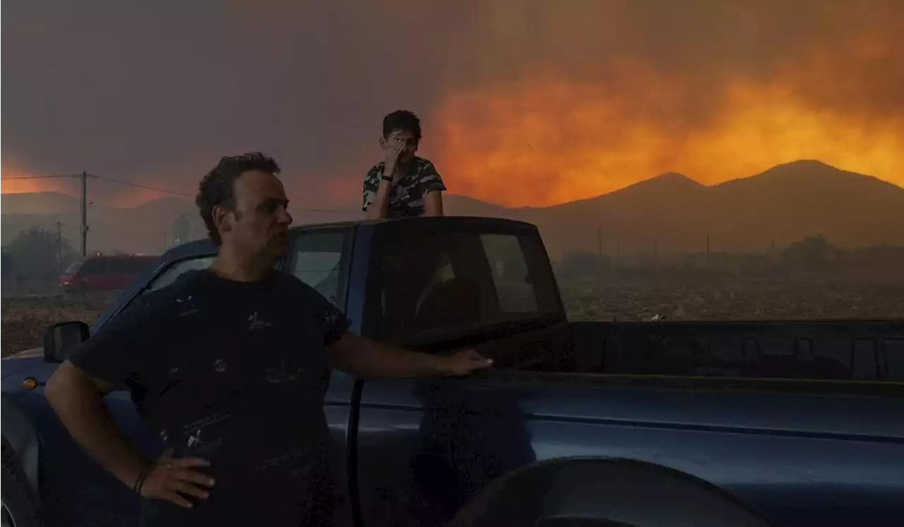 Wildfires torment Greece. California digs out from Hilary. What to know in extreme weather now