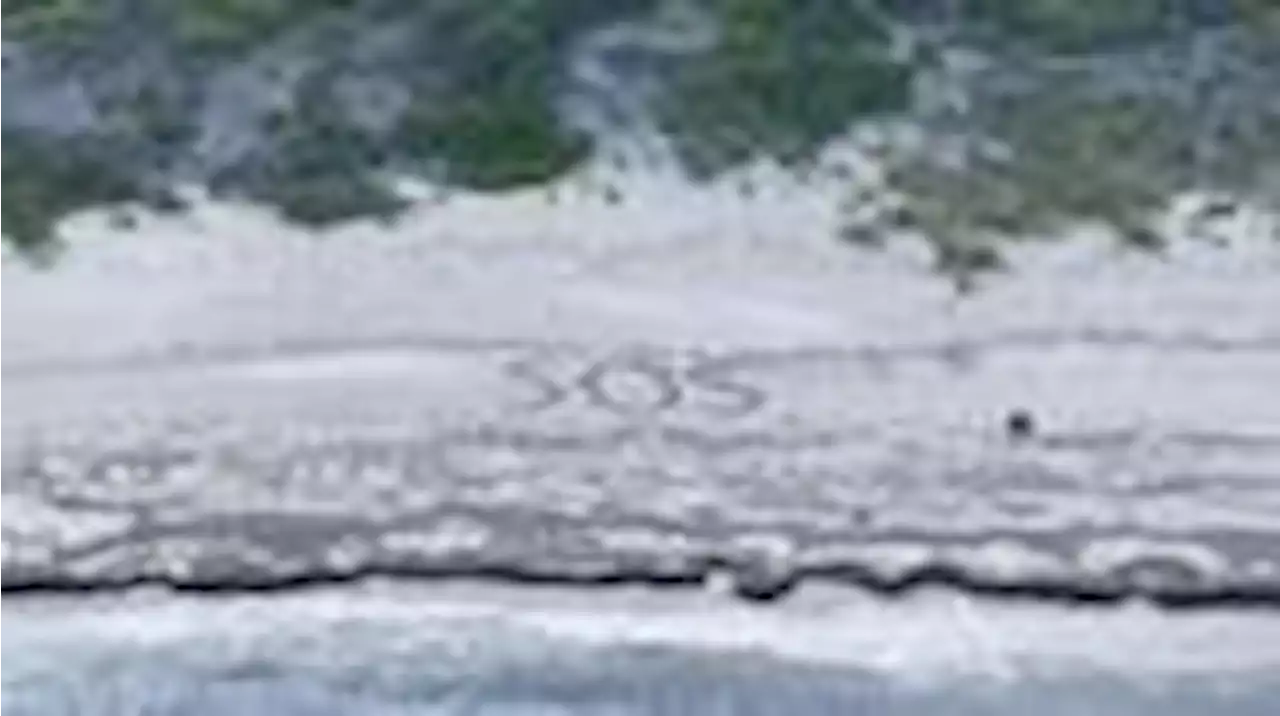 „sos“ im sand: us-küstenwache veröffentlicht rettungsfoto