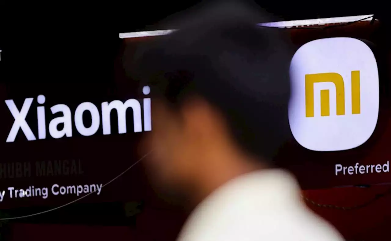 Exclusive-China's Xiaomi wins state planner nod to make EVs amid glut in autos