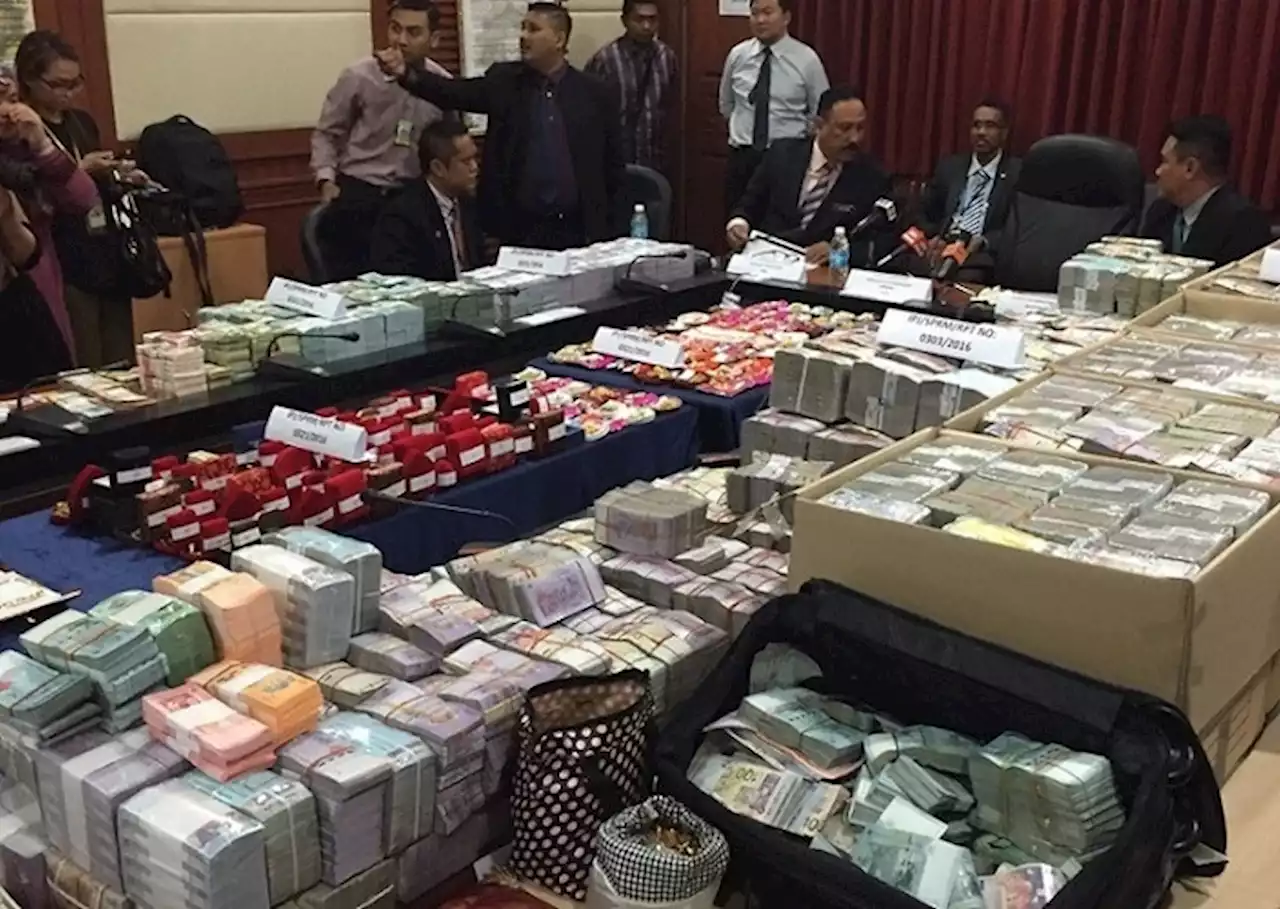 Money and items seized from Teo’s house