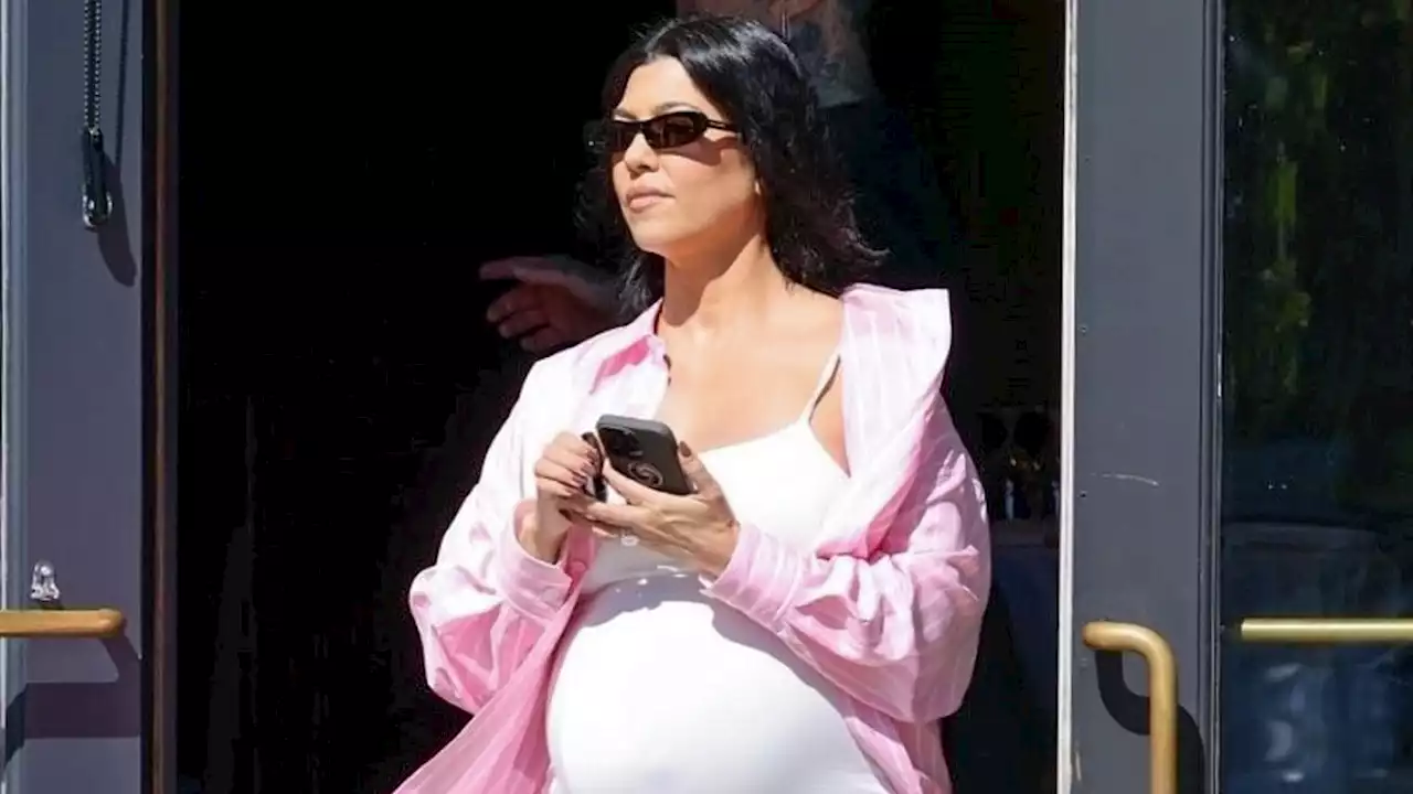 Kourtney Kardashian, 44, shows off her pregnancy bump in a bodysuit