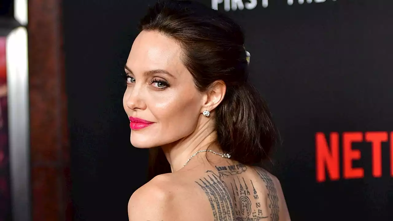 Angelina Jolie's Mystery Middle Finger Tattoos Revealed