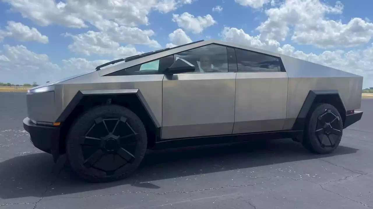 Elon Musk Shows Off 'Production Candidate' Tesla Cybertruck, Big Smile