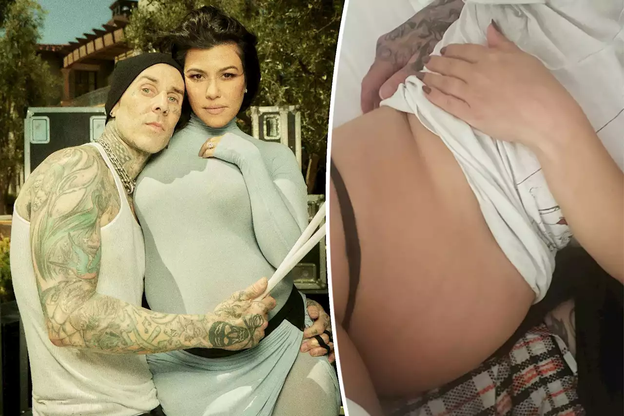 Pregnant Kourtney Kardashian bares baby bump in thong while cuddling Travis Barker