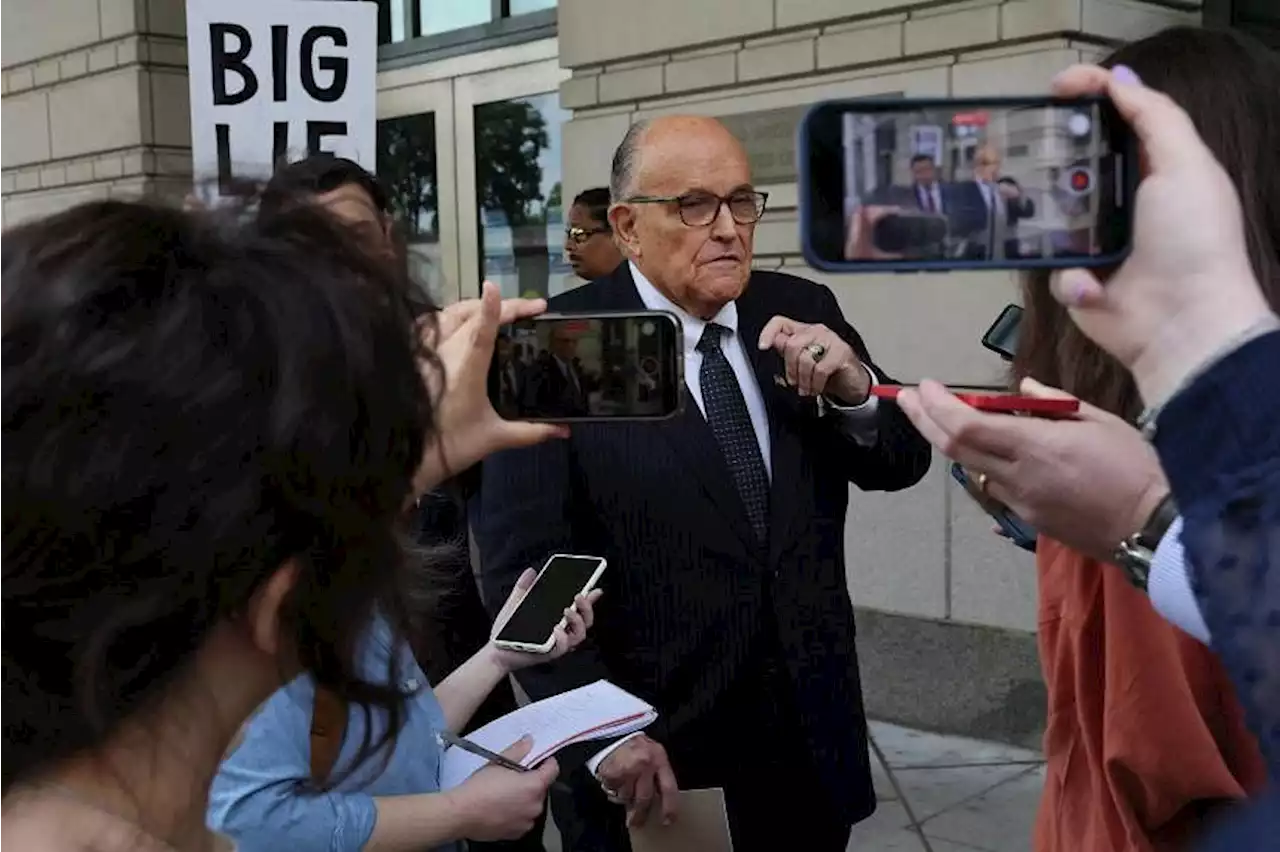 Rudy Giuliani surrenders in Trump election subversion case, $200,000 bond set