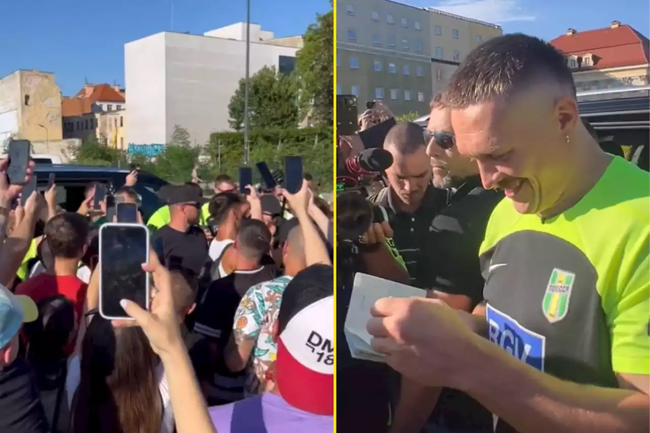 Usyk mobbed by fans at open workout ahead of Dubois clash and signs someone's passport