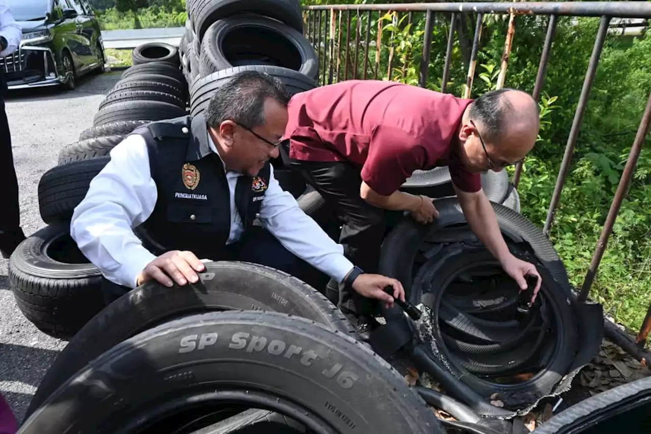 Kedai tayar dikompaun, longgokan tayar punca denggi di Melaka