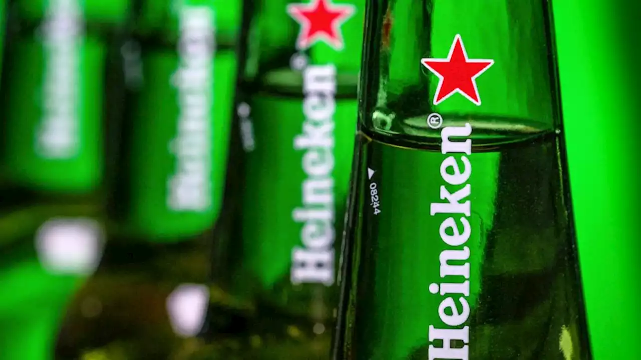 Dutch brewer Heineken sells its Russian operations for 1 euro, taking a 300-million-euro hit