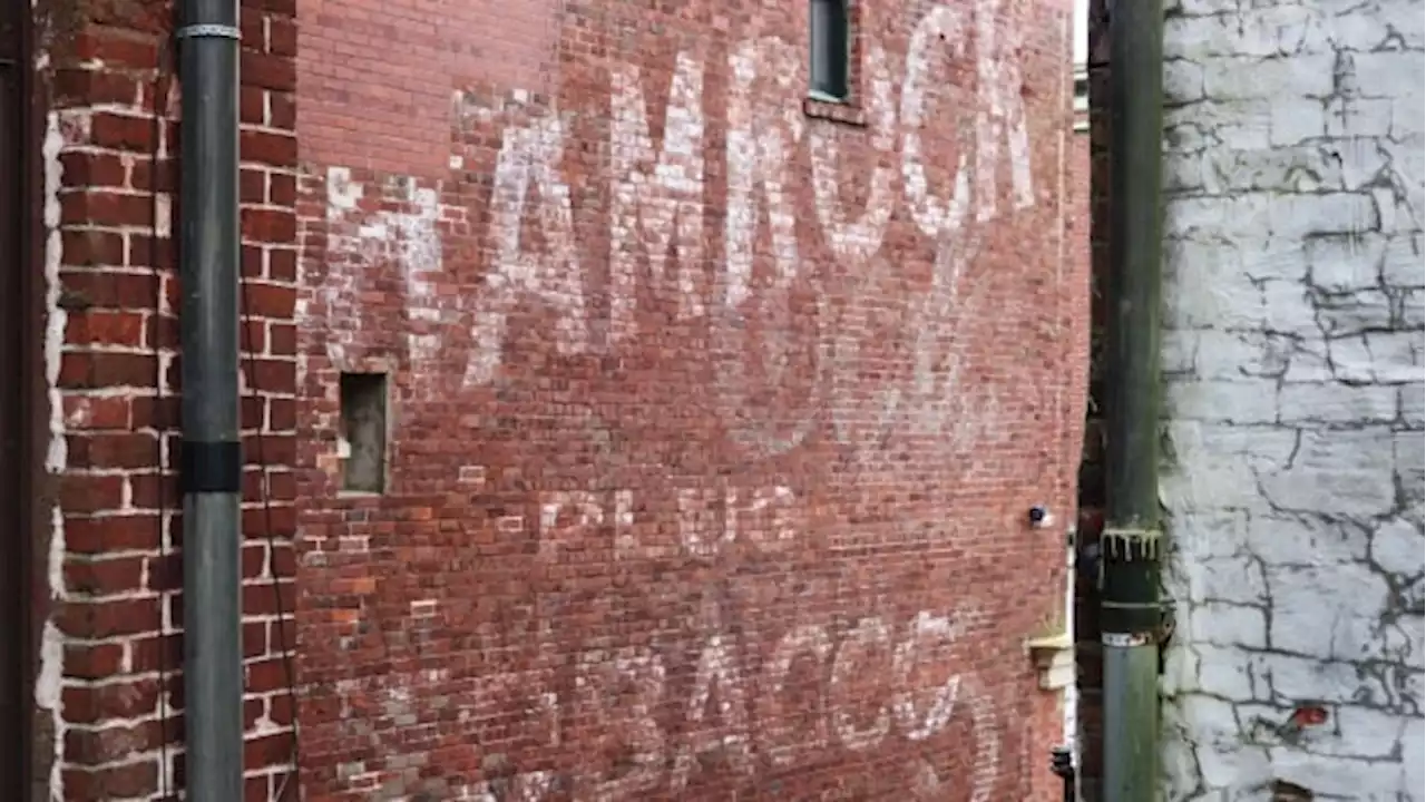 Fading murals and old brick ads: hunting for 'ghost signs' in uptown Saint John