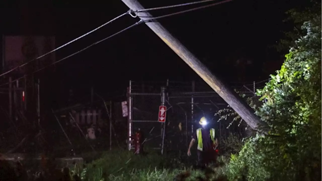 A Michigan storm with 75 mph winds downs trees and power lines; several people are killed