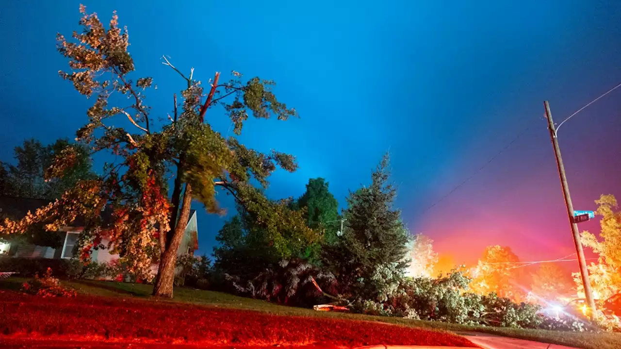 A Michigan storm with 121 kph winds downs trees and power lines; several people are killed