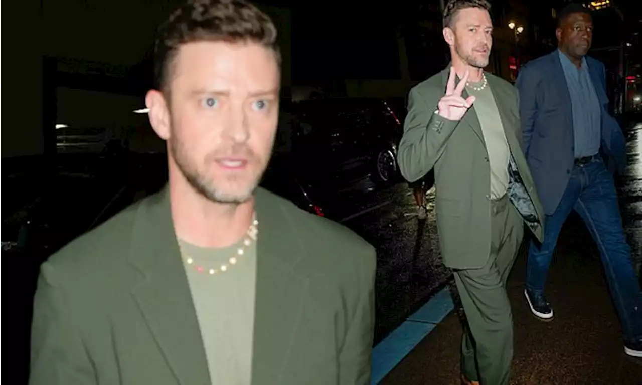 Justin Timberlake flashes a peace sign as steps out in New York