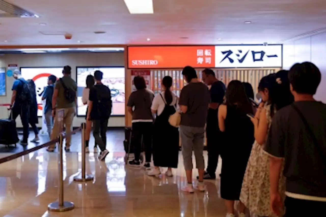 Hong Kong’s long sushi queues show few worried at Japan’s wastewater release