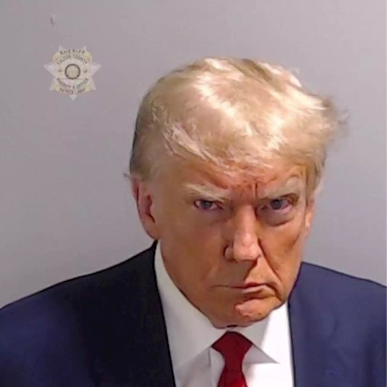 Trump’s mug shot released after booking at Georgia jail on election charges