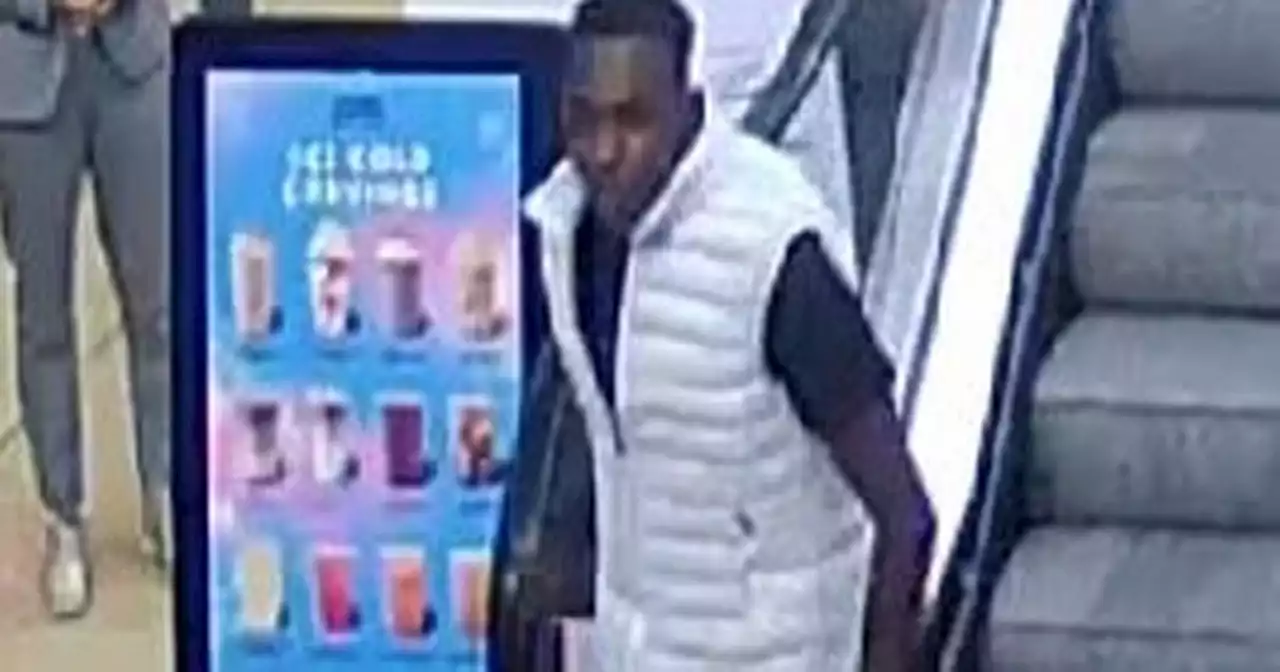 Police want to speak to this man pictured running through shopping centre