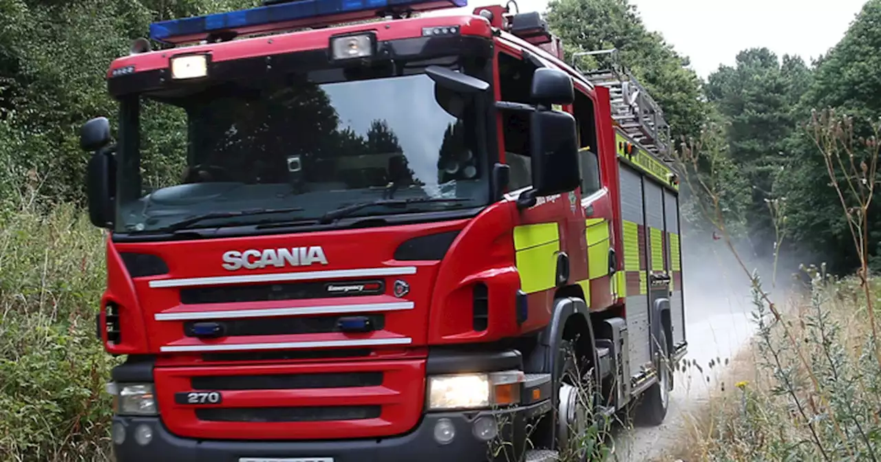 Fire crews battle blaze of 250 hay bales