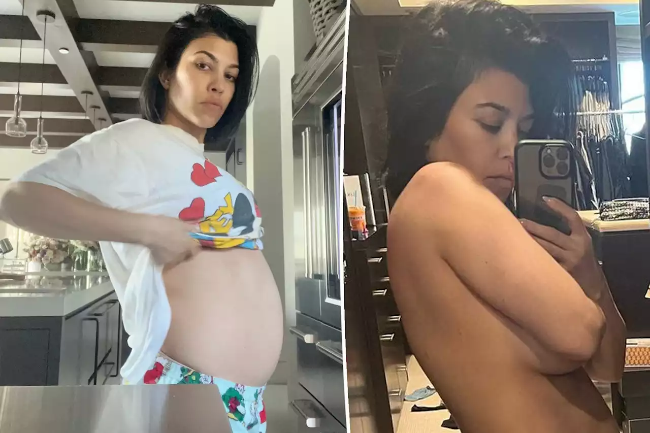 Pregnant Kourtney Kardashian poses topless, shows baby bump in unbuttoned jeans