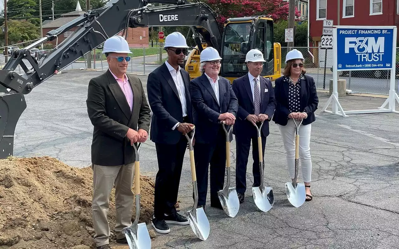 Officials break ground on central Pa. affordable housing apartment building, grocery store