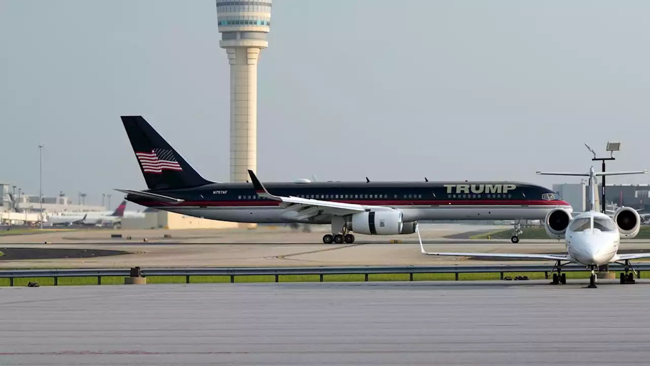 US politics latest: Donald Trump lands in Atlanta where he's set to surrender to authorities