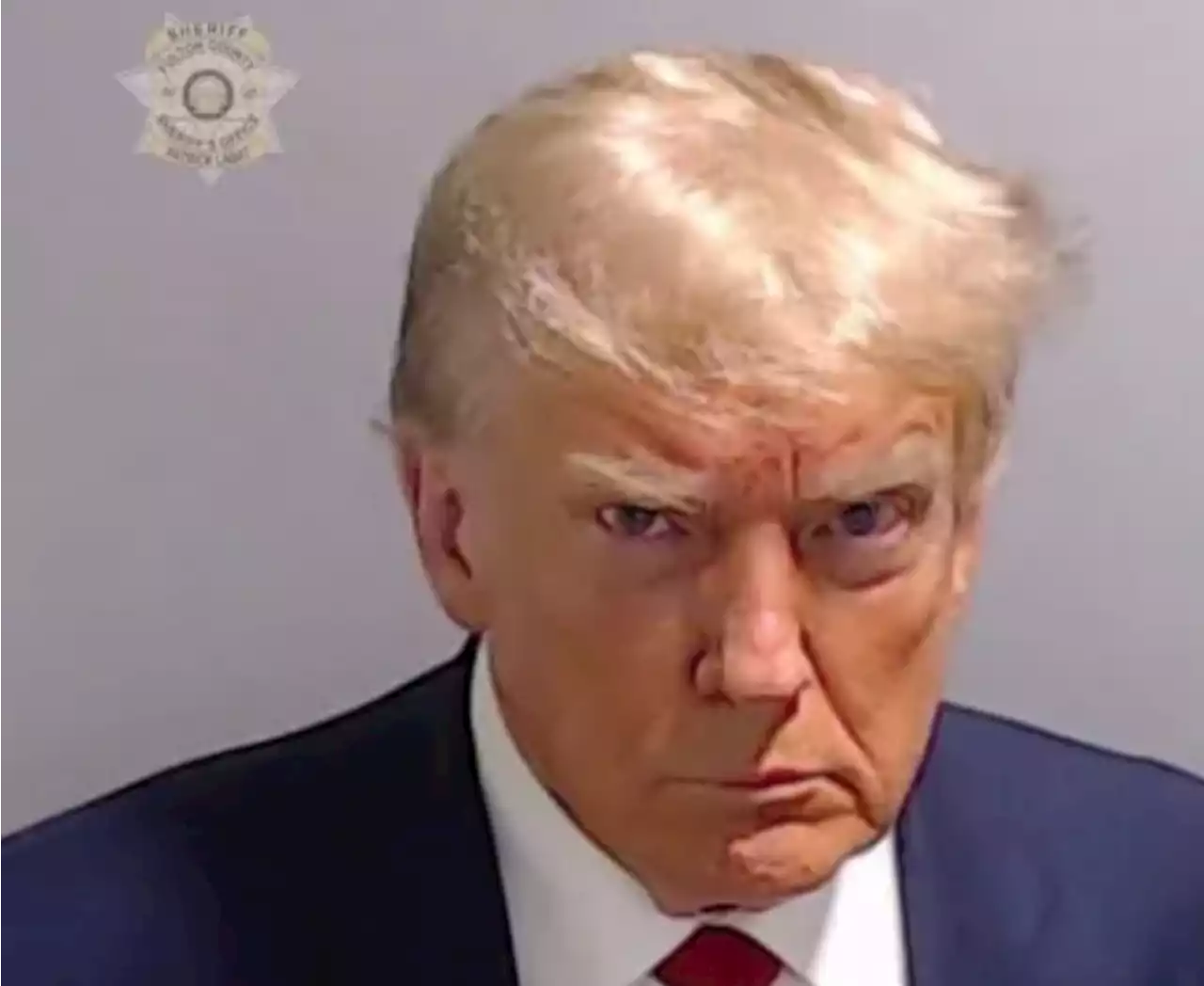 Trump becomes first former US president to have mugshot taken