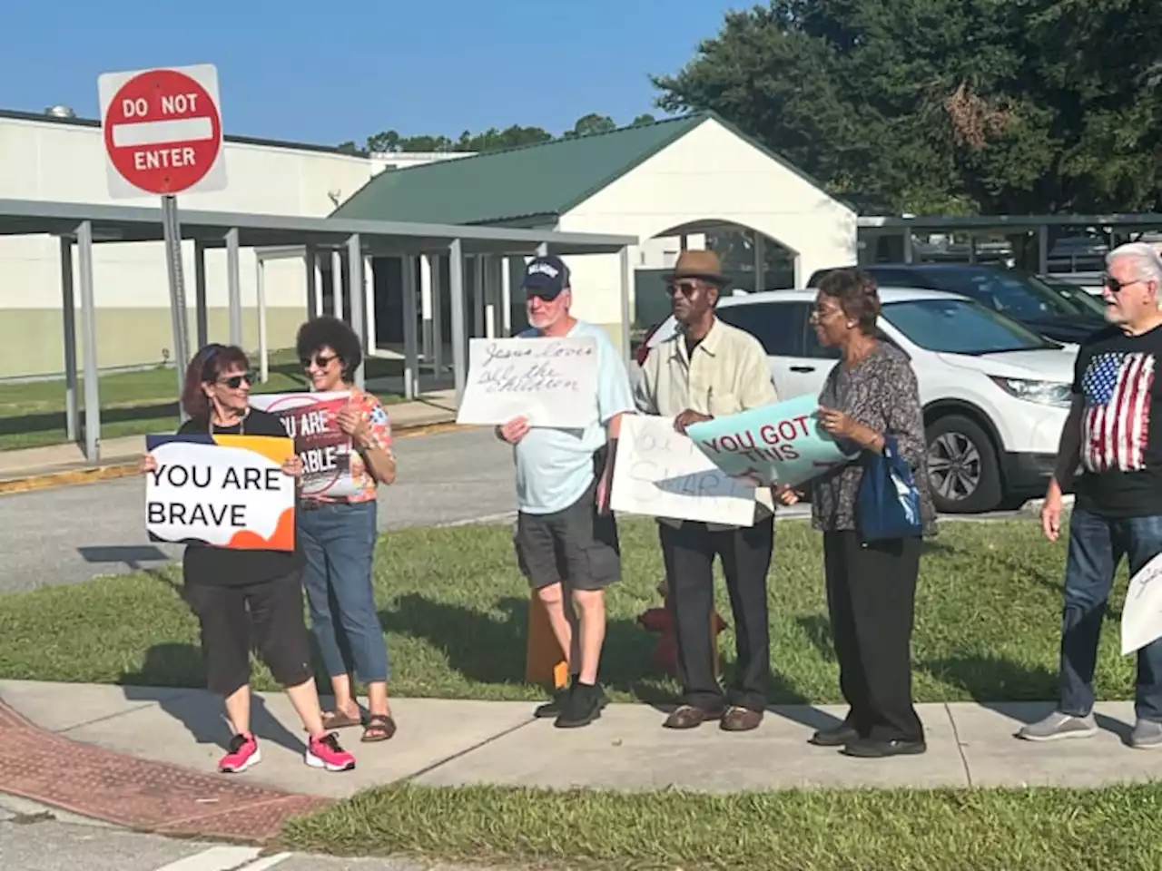 Faith, local leaders encourage Bunnell Elementary students arriving to school after controversial school assembly