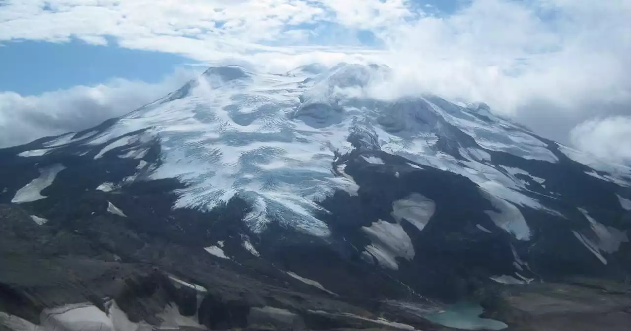 Marooned atop an Alaska mountain in a helicopter with ice-encrusted rotor blades