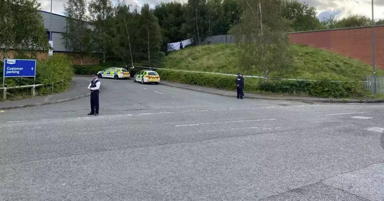 Man's body found behind retail park as death 'unexplained'