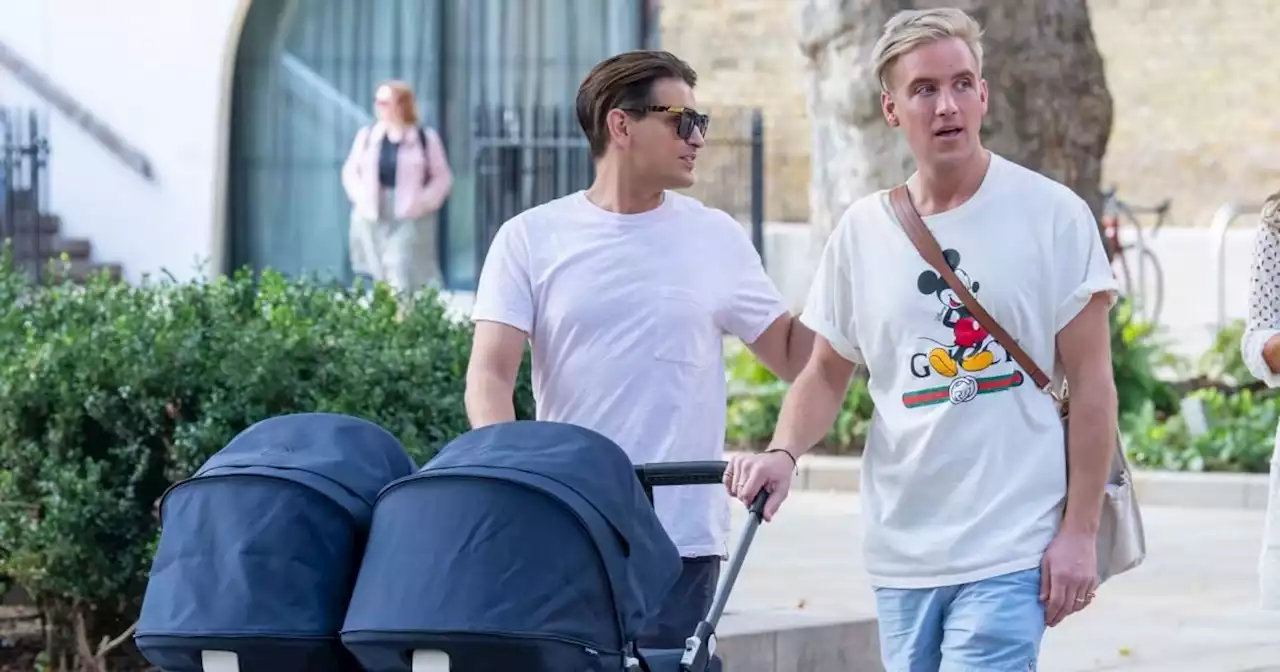 Ollie and Gareth Locke-Locke enjoy sunshine walk with newborn twins