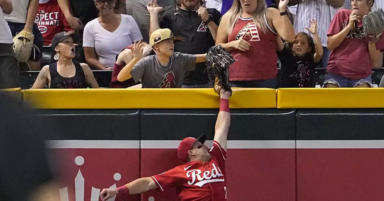 Pham pierde jonrón por interferencia de fanático; Diamondbacks vencen a Rojos 10-8