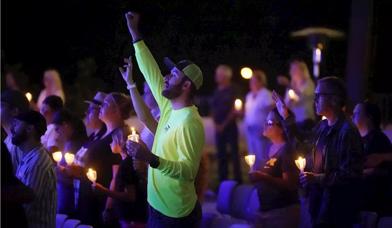 A father describes rushing his 7-month-old to safety during a California biker bar shooting