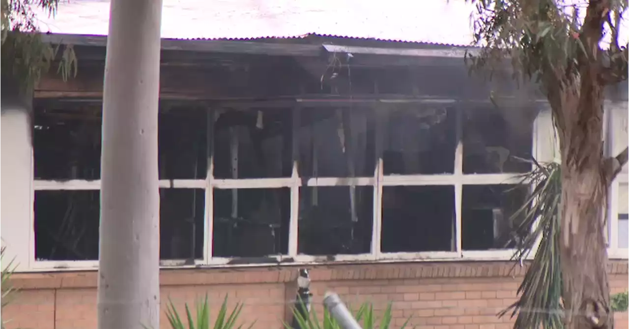 Police search for man after 'significant' fire at Melbourne school