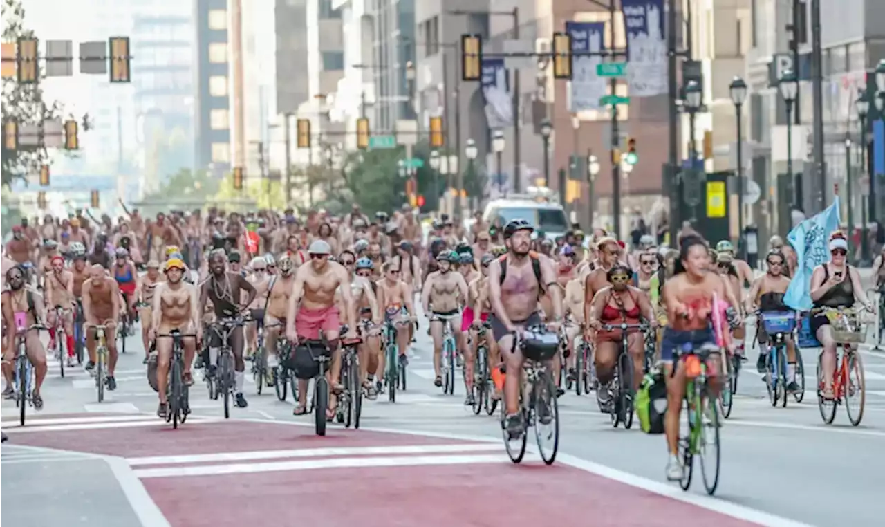 Riders in various states of undress cruise Philadelphia streets in 14th naked bike ride