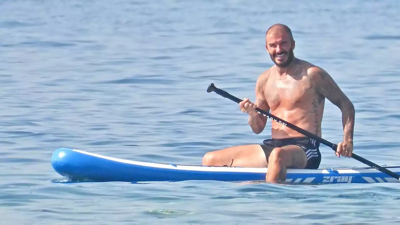 David Beckham goes paddleboarding with his son Cruz, 18, in Croatia