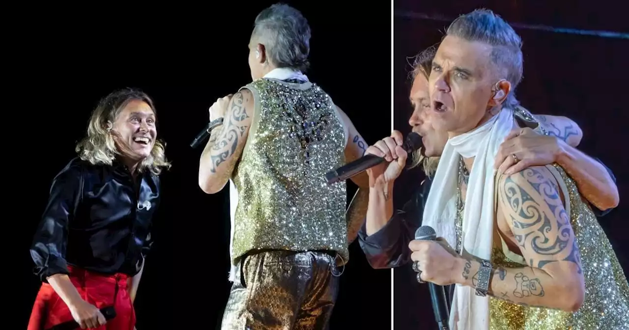 Robbie Williams shares emotional stage reunion with Take That's Mark Owen