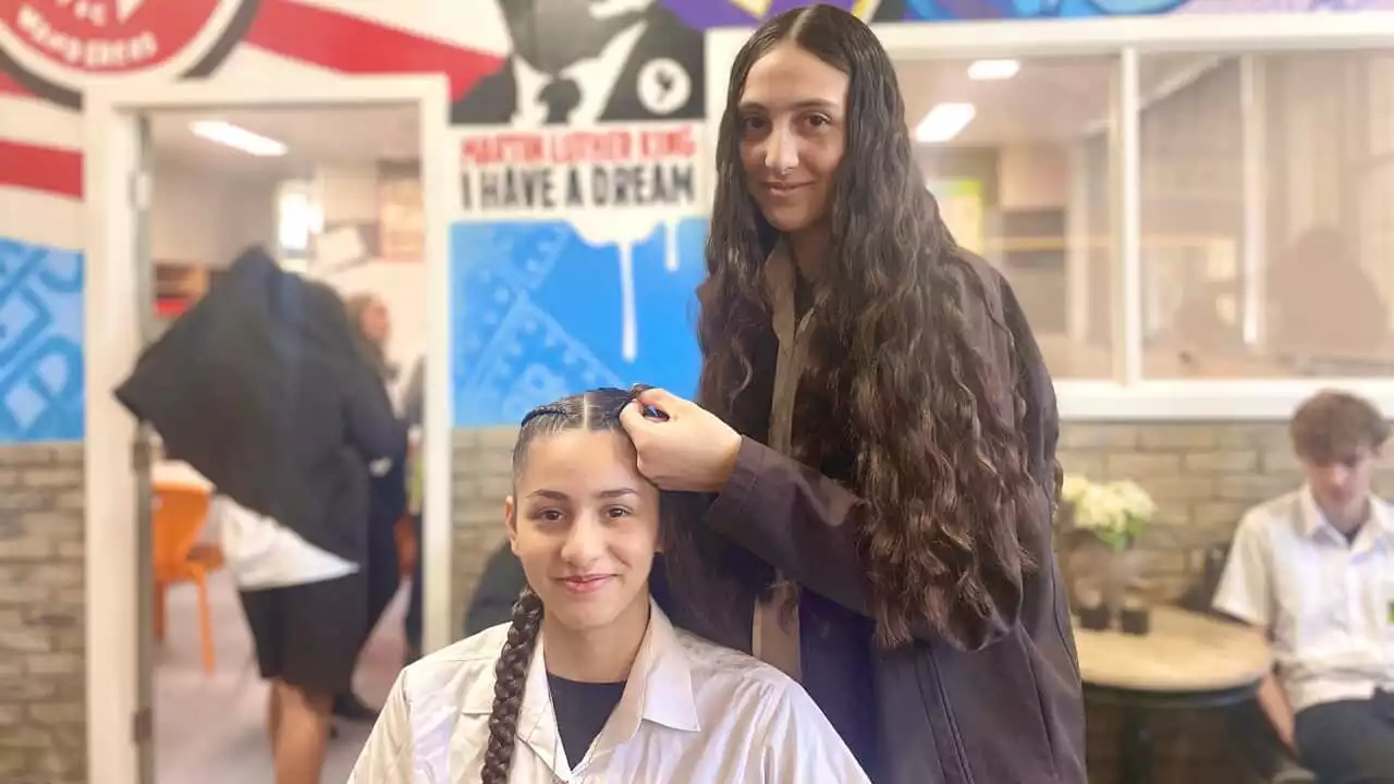 There's a buzz around this hair salon, and it’s about more than braids and fades