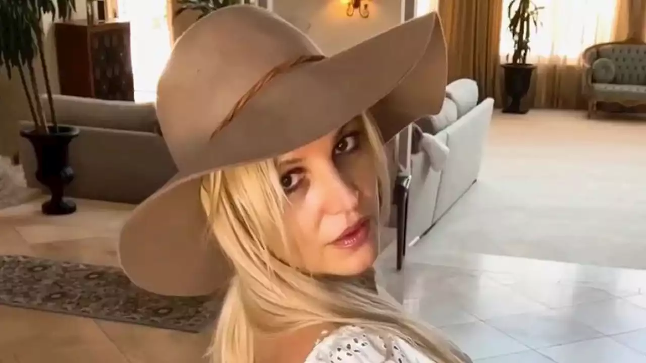 Britney Spears nearly topples out of plunging bra in concerning new video