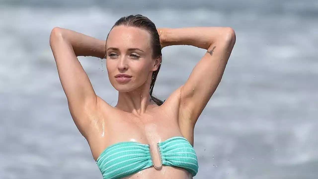 Jorgie Porter wows in a skimpy strapless blue bikini in Spain