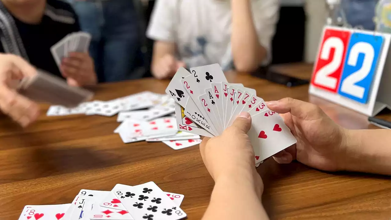 China's financial players turn to Guandan card game amidst shifting investment landscape