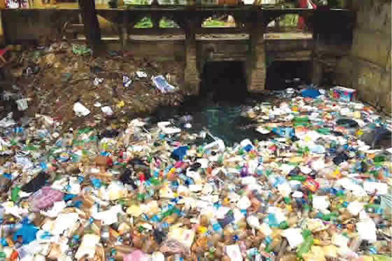 Lagos residents fear disease outbreak as refuse blocks canal