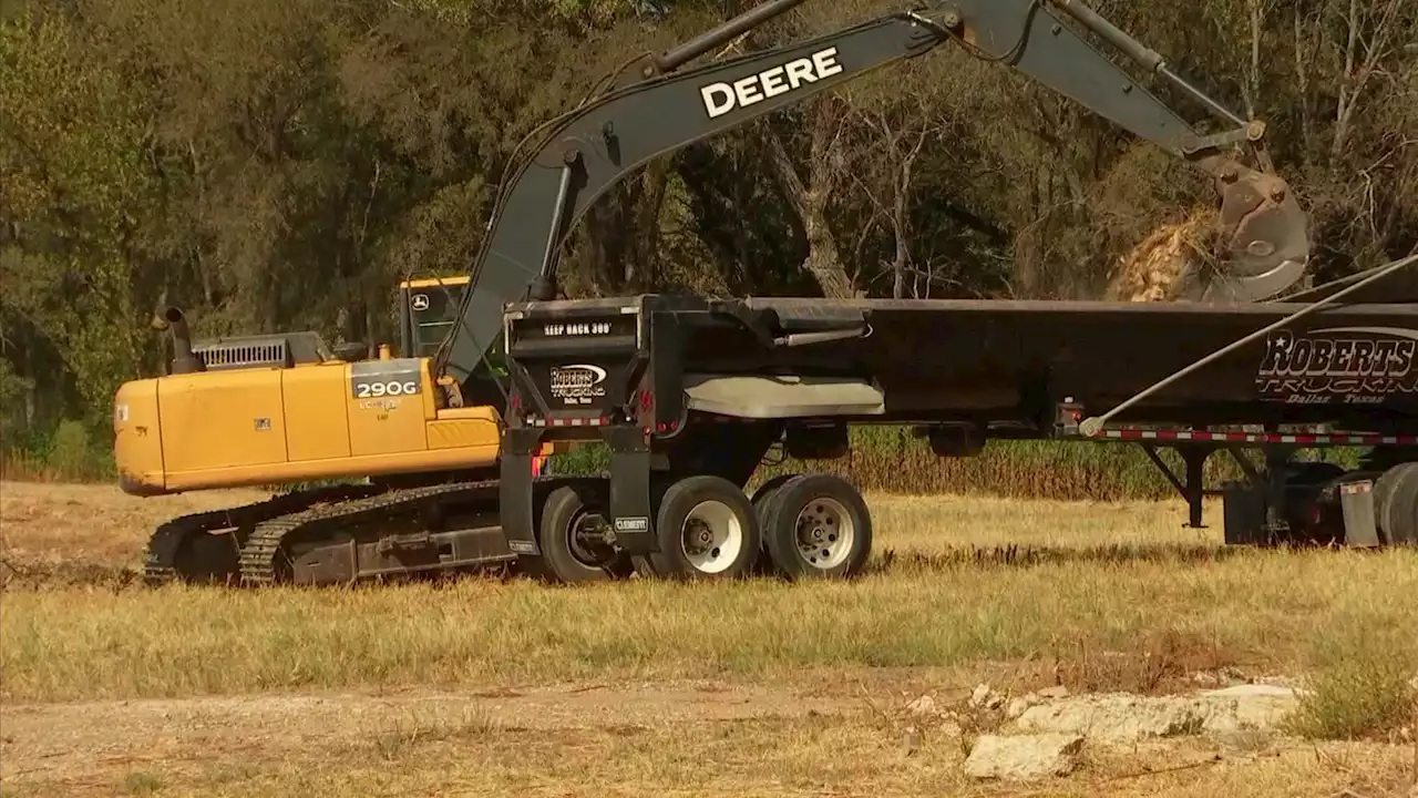 Crews begin removing decades-old contaminated dirt from ‘Shingle Mountain' recycling site