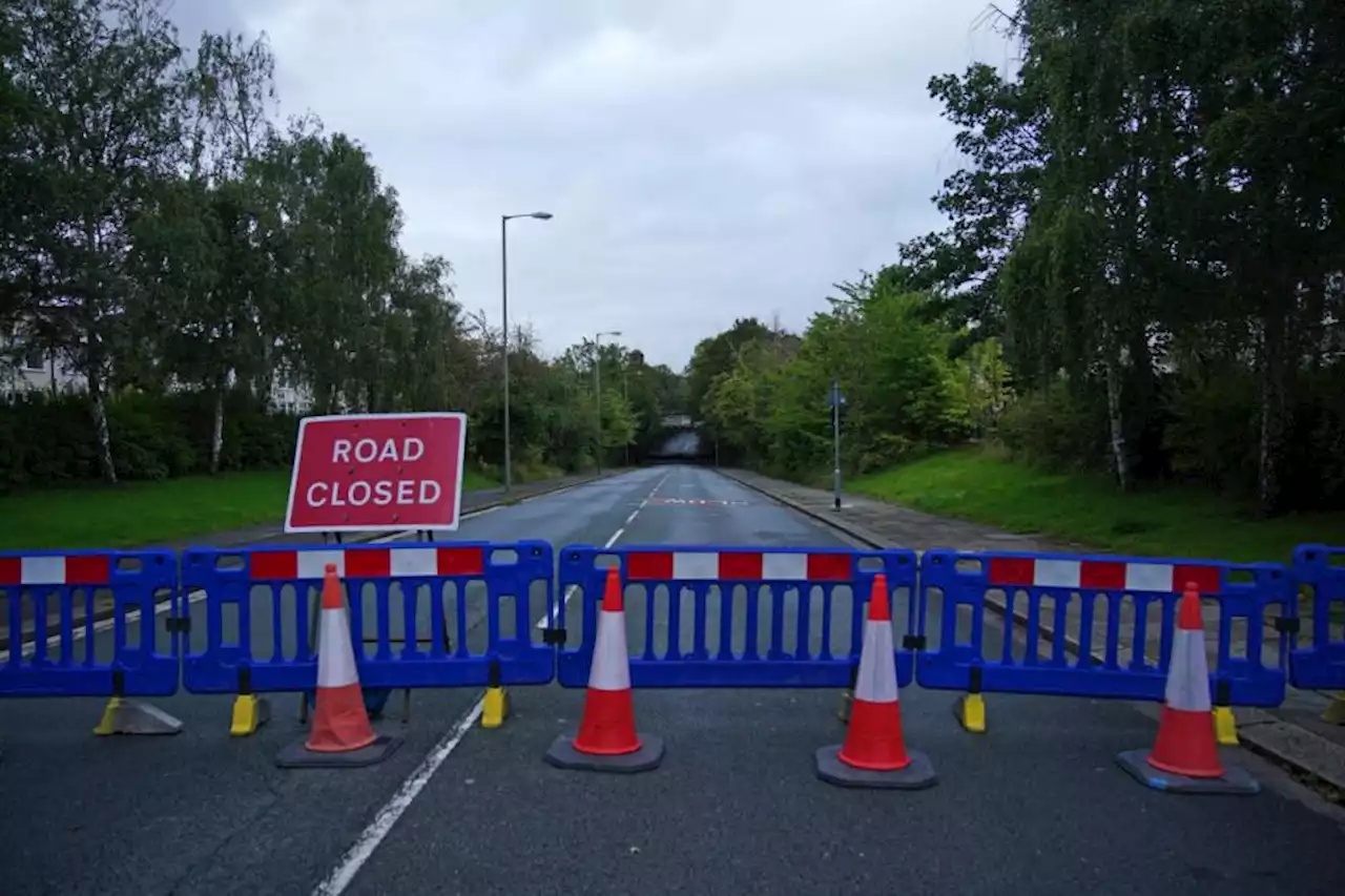 Mossley Hill road remains shut as two people die after driving into flooded area