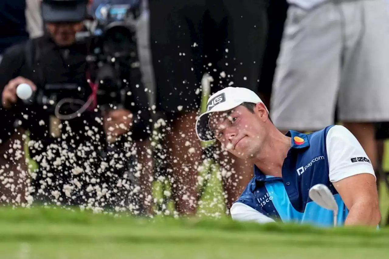 Viktor Hovland holds off Xander Schauffele to claim FedEx Cup title