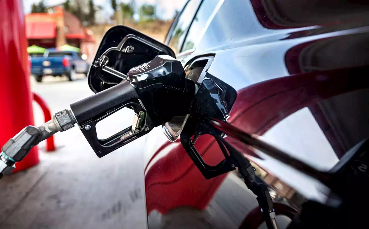Gas prices are down slightly but experts warn stormy issues could push them up again